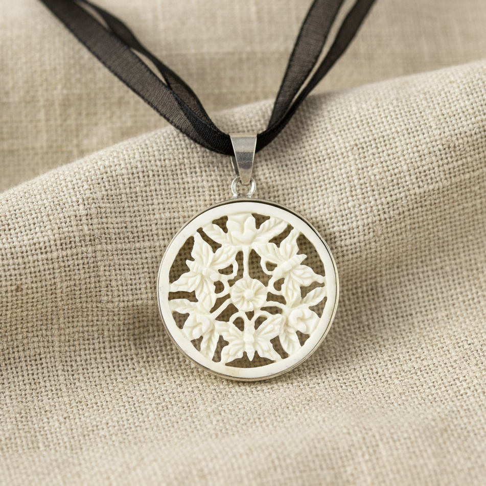 Hand Carved Round Perforated Bone Butterfly Pendant in Silver Casing Necklace
