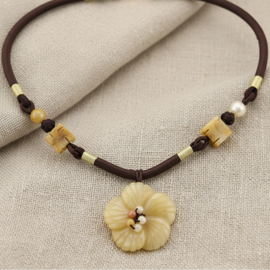 Carved Natural Stone Flower Pendant and Beads - Black Woven Necklace