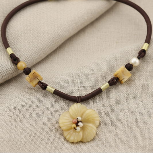 Carved Natural Stone Flower Pendant and Beads - Black Woven Necklace